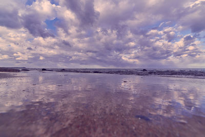 Scenic view of sea against sky at sunset