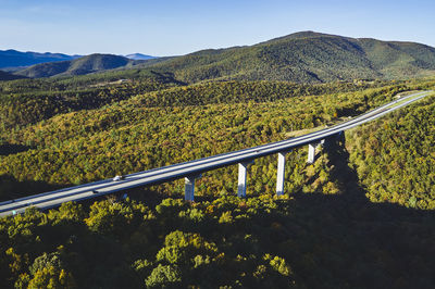 Usa, west virginia, drone view of clifford hollow bridge in autumn