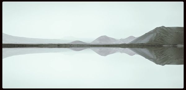 Scenic view of mountains against clear sky