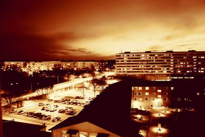 Cityscape against cloudy sky