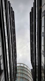 Low angle view of skyscrapers against sky