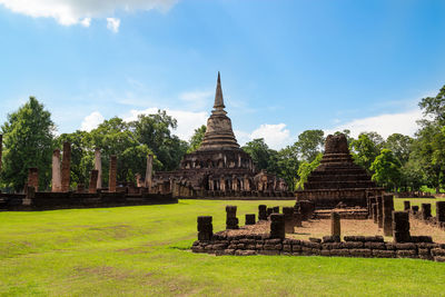 Old temple against building