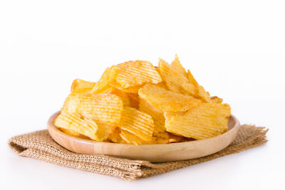 Close-up of burger against white background