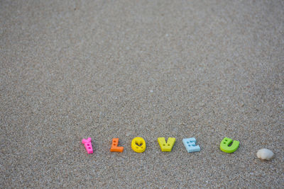 High angle view of colorful i love you text at beach
