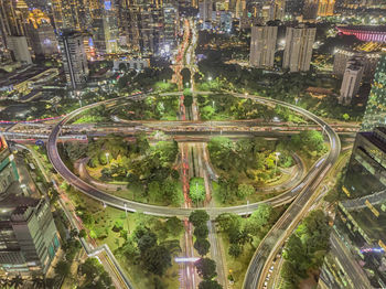 High angle view of road amidst buildings in city