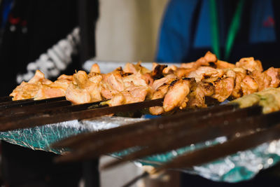 Close-up of meat on barbecue grill