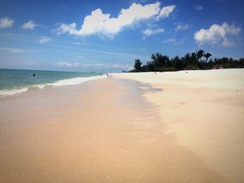 Scenic view of beach against sky