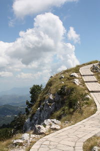 Built structure against cloudy sky