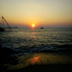 Scenic view of sea at sunset