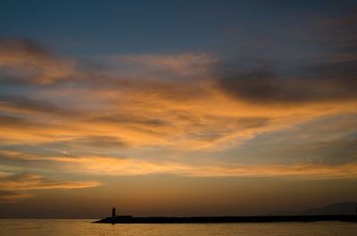 Scenic view of sea at sunset