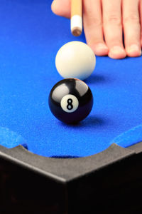 Close-up of human hand on table