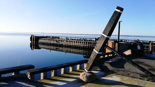 Pier over sea against sky