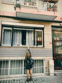 Rear view of a woman walking outdoors