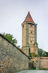 Low angle view of historic building against sky