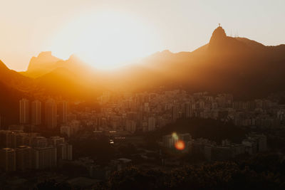 High angle view of buildings against sky during sunset