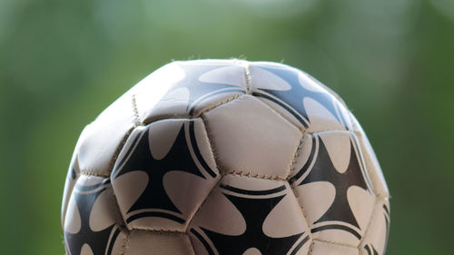 Close-up of soccer ball on grass