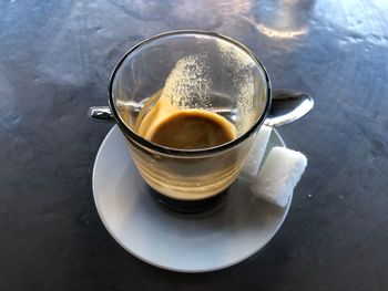 High angle view of coffee cup on table