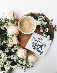 High angle view of coffee cup on table