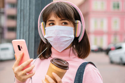 Young woman using mobile phone