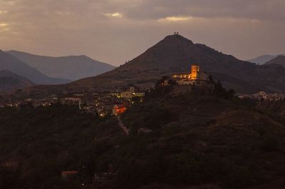 Buildings with mountains in background