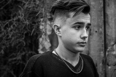 Portrait of handsome young man in the street