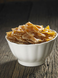 Close-up of farfalle pasta on table