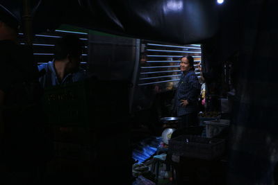 People standing in kitchen