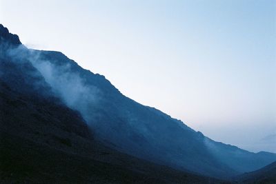 Scenic view of mountains during foggy weather