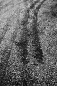High angle view of shadow on sand