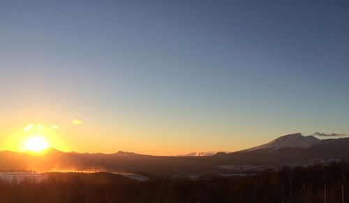 Scenic view of mountains at sunset