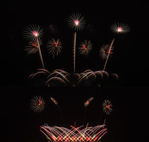 Firework display at night