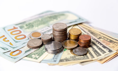 High angle view of coins on table