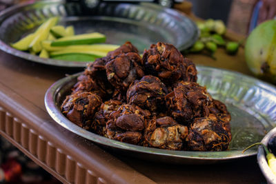 Close-up of meat in bowl on table