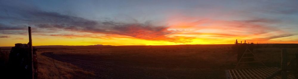 Scenic view of landscape at sunset