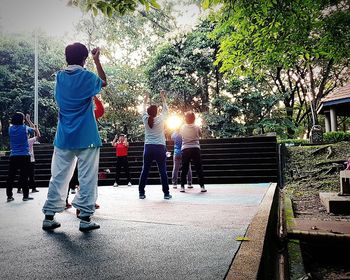 Rear view of people in park