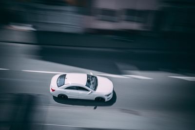 Blurred motion of car moving on road