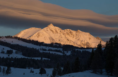 Scenic view of mountains against sky during winter