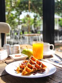 Close-up of breakfast served on table