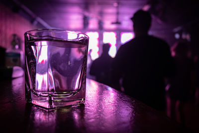 Nightclub glass on bar
