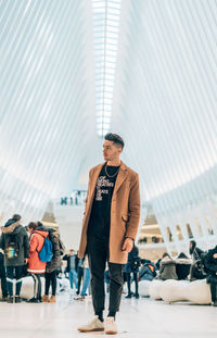 Full length of man looking at camera