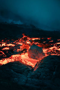 Close-up of bonfire against sky at night