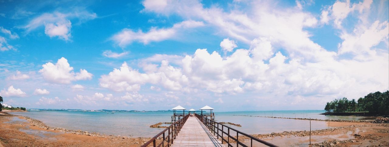 sea, sky, water, horizon over water, cloud - sky, pier, beach, tranquility, railing, scenics, tranquil scene, cloud, beauty in nature, nature, cloudy, the way forward, shore, wood - material, jetty, idyllic