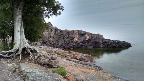 Scenic view of rock formation in sea