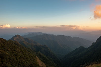 Scenic view of mountains against sky during sunset