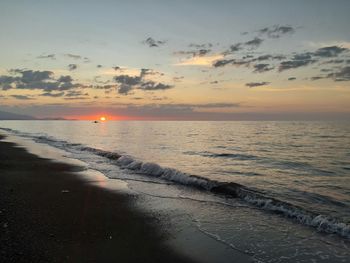 Scenic view of sea against sky during sunset