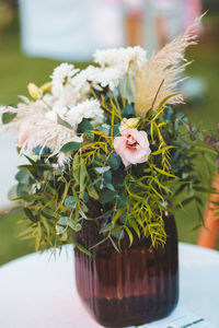 Close-up of flowers in vase on table