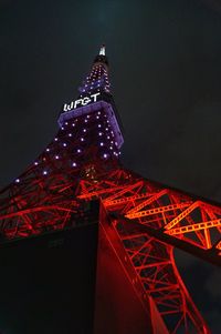 Low angle view of illuminated city at night