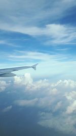 Low angle view of airplane flying in sky