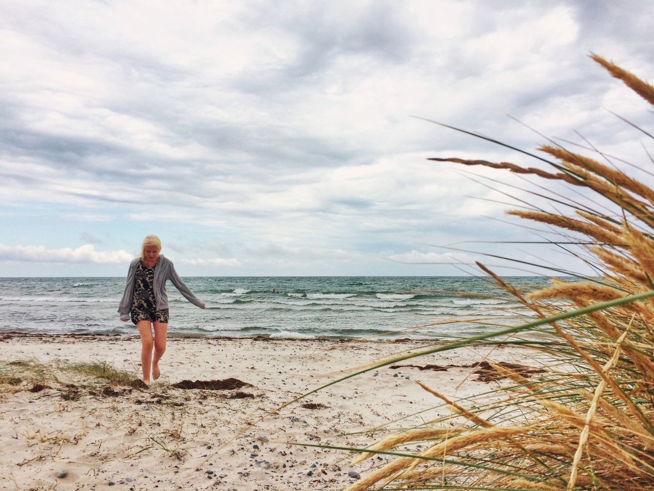 sky, sea, horizon over water, beach, water, lifestyles, leisure activity, full length, cloud - sky, rear view, shore, standing, tranquility, tranquil scene, beauty in nature, cloud, nature, scenics