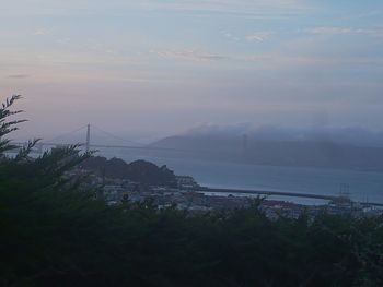Scenic view of sea against cloudy sky